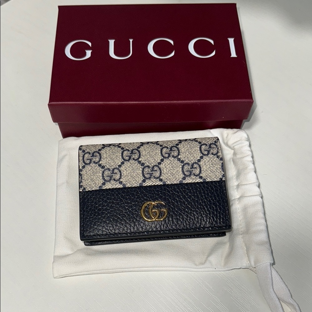 Gucci Cream and Blue Wallets Collection